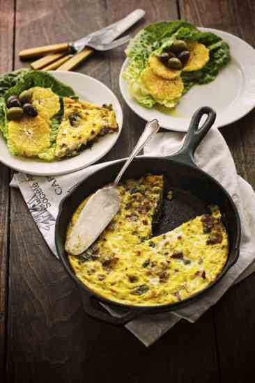 
This Easy Frittata Recipe is full of greens, bacon and salty feta cheese, and is sure to be a winner at the dinner table.
